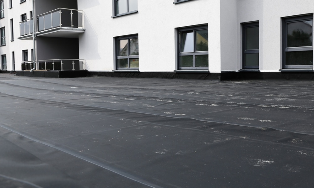 Cost of flat roof repair breakdown with tips on saving money, including budgeting for repairs and regular maintenance strategies