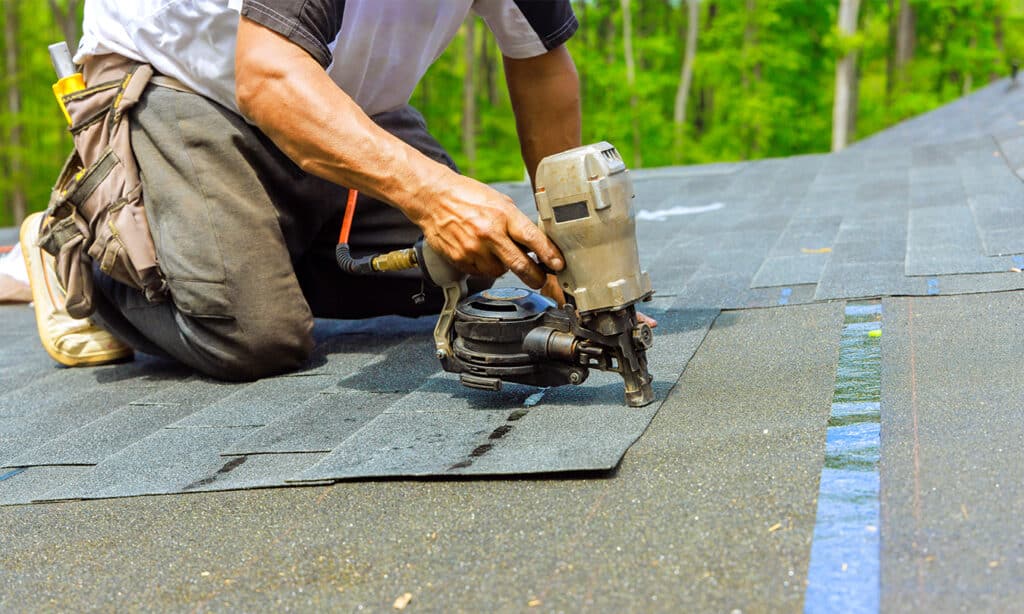 DIY shingle roof repair, with steps to remove damaged shingles, replace with new ones, and seal nail heads for a secure fix.