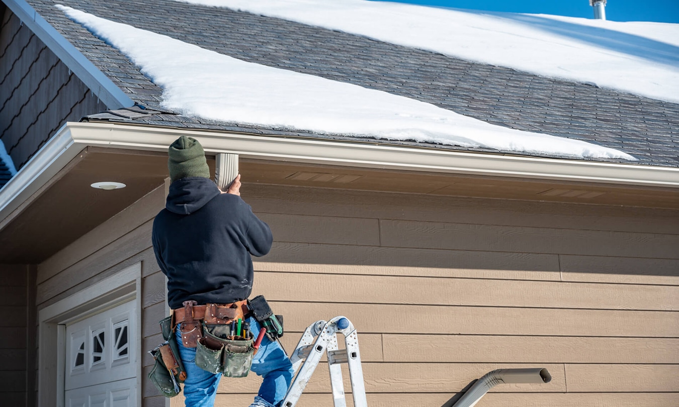 Pre-winter roof inspection to check shingles, flashing, and attic for potential issues.